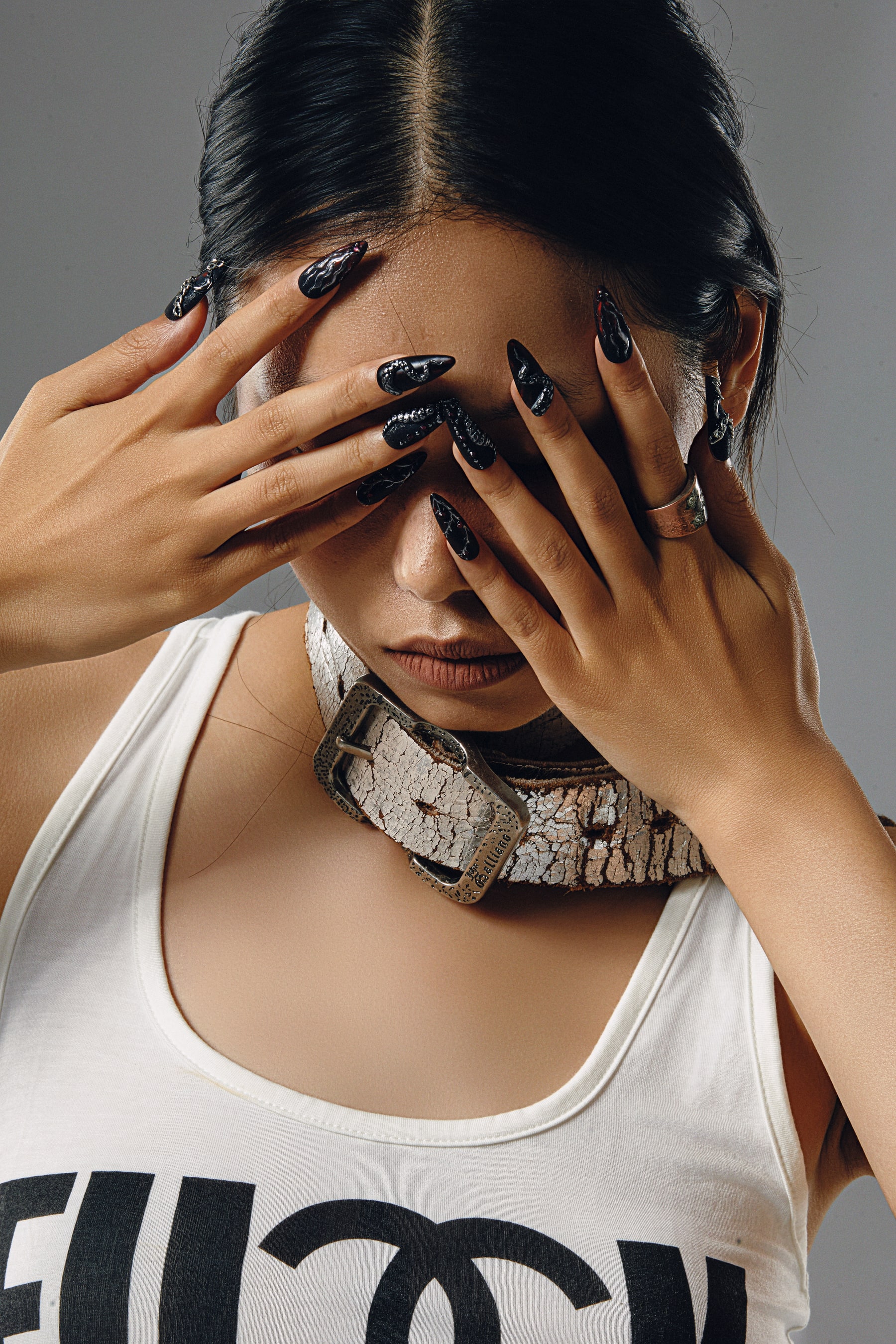 Model wearing the EMBER SINNER nail set